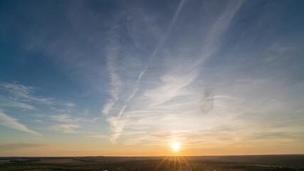 Wall Mural - Epic Sunset Timelapse Wide Angle Aerial High Altitude Panoramic Golden Hour Sky