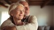 © Johannes - happy senior adult mature classy couple hugging bonding thinking of good future carefree cheerful mid age old husband embracing wife looking away dreaming enjoying wellbeing and love in new house no