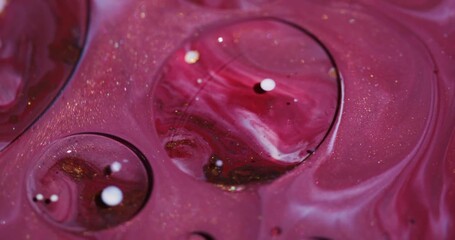Wall Mural - Ink stream. Oil bubbles. Defocused red purple white color acrylic sparkling water glitter flow floating on abstract art background.