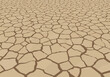 © OSTI - Cracked Earth Surface Texture in Arid Landscape.