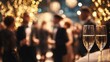 © PrettyVectors - Elegant Christmas party with blurred golden bokeh lights. Sophisticated guests with champagne glasses in designer attire