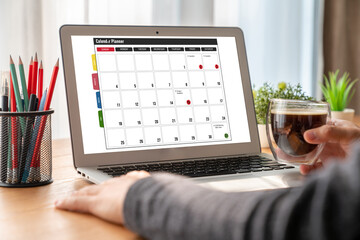 Wall Mural - Calendar on computer software application for modish schedule planning for personal organizer and online business