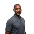 © velikiyzayats - Smiling middle-aged Black man in a dark grey polo shirt looking confidently at the camera against a black background.