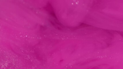 Wall Mural - Spreading glitter. Paint swirl. Art sparkling particles water flow. Neon color emulsion explosion pink white silver abstract background.