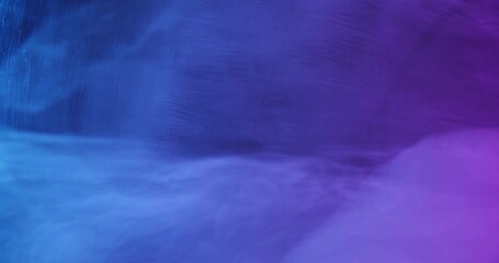 Wall Mural - Fluorescent vapor. Smoke cloud. Blur blue purple neon color paint splash acrylic underwater texture spreading on abstract background.