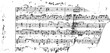 © appl - Black and white image of a torn sheet of music with handwritten notes and symbols.