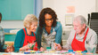 © Monkey Business - Group Of Retired Seniors Attending Art Class In Community Centre With Teacher