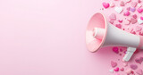Megaphone on pink background surrounded by heart shaped decorations symbolizes communication and love