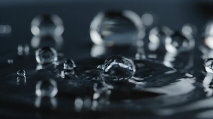 Wall Mural - Dynamic water droplets flow and merge across a smooth, reflective surface in ultra slow motion merge, reflective, pattern