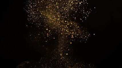 Wall Mural - shimmering gold particles slowly spiral and dissipate like a cosmic dust cloud in macro view sparkli