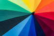 © ADDICTIVE STOCK - Close-up of a vibrant rainbow umbrella