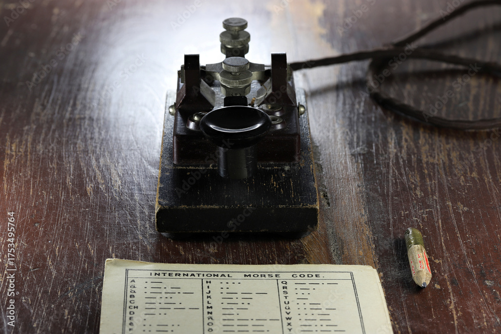 morse key with morse code chart on desk Stock Photo | Adobe Stock