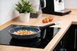 © Proxima Studio - Cooking fresh vegetables in a pan