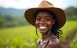 © wang - Happy, farm and black woman on holiday in the countryside of Colombia for adventure, peace and calm in summer. Face portrait of African girl with smile for travel vacation in agriculture and nature