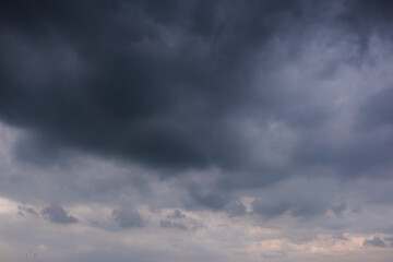 Wall Mural - Dark sky with stormy clouds. Dramatic sky rain,Dark clouds before a thunder-storm,clouds before rain