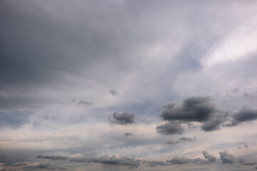 Wall Mural - Dark sky with stormy clouds. Dramatic sky rain,Dark clouds before a thunder-storm,clouds before rain