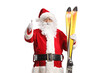 © Ljupco Smokovski - Santa Claus holding a pair of skis and gesturing thumbs up
