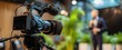 © Studio Nova - The Video Camera Recording a Speaker at a Corporate Event