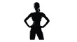 © nanda - A powerful silhouette of a fit athletic woman standing in a confident pose, representing strength, health, and a healthy lifestyle