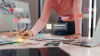 Wall Mural - Professional designer working digital color palette selection for creative graphic user experience development project in modern studio office