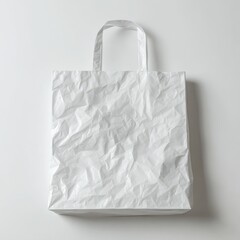 Wall Mural - Crumpled White Paper Bag with Subtle Textures on Clean Background