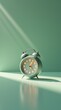 © Roman - Green alarm clock sitting on a table in the sun