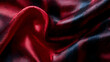 © Pickoloh - Close-up of flowing black and red satin fabric, showcasing smooth texture and elegant draping