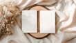 © 楠 刘 - Minimalist wedding invitation mockup with two vertical cards on round wooden slice, soft beige fabric, dried flowers, natural daylight, neutral elegant flat lay composition, realistic editorial style.