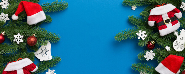 Wall Mural - Christmas background with fir branches and Christmas decor. Top view, copy space for text