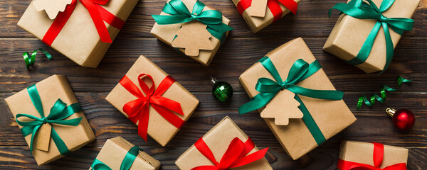 Wall Mural - Colored craft gift boxes with colorful ribbons on colored background. Collection of Christmas present boxes