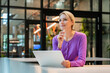 © BusinessClass by W61 - Thoughtful businesswoman working with tablet in modern office