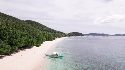 Wall Mural - Aerial View of Iloc Island, Philippines, White Sand and Boat at the Beach, Green Landscape and Turquoise Sea