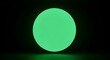 © Isa - glowing green sphere dark background