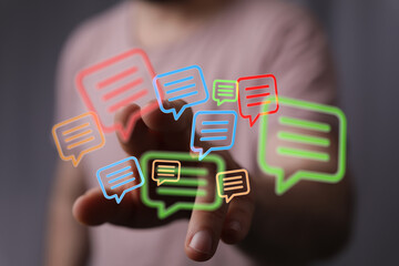 Man interacting with digital communication interface, messages and notifications over the internet, modern social network and chat platform conc