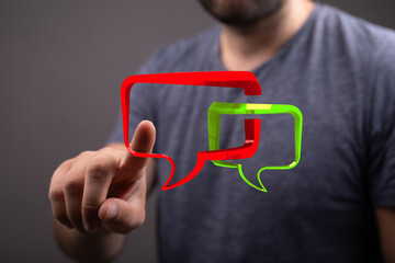 A man touches digital communication bubbles, symbolizing connection, networking, and modern technology use, for social interaction in business o
