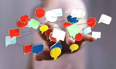 Wall Mural - A network of colorful speech bubbles floating in a hand, symbolizing communication, connection, and the sharing of ideas.