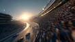 © Prasanth - Fast race track with blurred motion effect, showing a turn with stands and crowd.