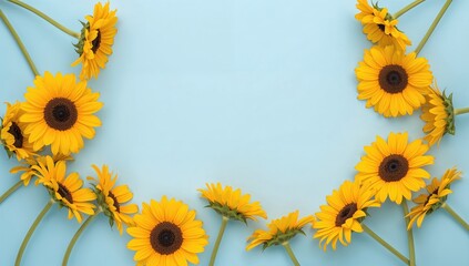 Wall Mural - Greeting card design featuring vibrant sunflowers against a soft blue backdrop. Top-down perspective with ample copy space.