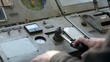 © mediawhalelicensing  - Operator controlling machinery on vintage industrial panel. Clip