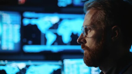 Cybersecurity Expert Monitoring Global Network Operations in a Dark Control Room.