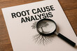 © Creative mind - A root cause analysis document with a magnifying glass for the concept of business.