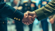 © Vitor - Aperto de Mãos entre Oficiais Militares Representando Acordo ou Cooperação