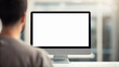 © AucArtStudio - Upcoming new year business goal change office computer monitor with blank screen and person working focused in modern workspace