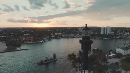 Wall Mural - aerial drone view of Sunset over Hillsboro Beach, Florida with city and Lighthouse 