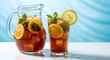 © Isa - refreshing iced tea pitcher and glass with lemon mint