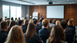 © janzwolinski - Business Meeting Attendees Listening to a Presentation
