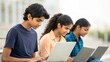 © N7 - Group of Indian teenagers using laptops — representing technology skills, focus, and education