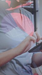 Wall Mural - Animation of infographic interface over caucasian woman scrolling on digital tablet