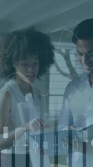 Wall Mural - Animation of financial data processing over diverse business people in office