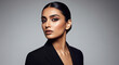 © Yash - Fashion portrait of woman in black blazer with winged eyeliner